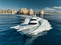 Elegant sportfishing yacht in the ocean in Cabo, Mexico sailing leisurely through a tranquil bay