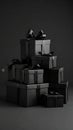 Elegant stack of black gift boxes with ribbons against a dark monochromatic background Royalty Free Stock Photo