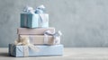 Elegant stack of blue and beige gift boxes with ribbons Royalty Free Stock Photo