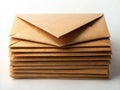 Elegant Stack of Brown Craft Envelopes on a Pristine White Background Minimalist Mailing Supplies for a Refined Royalty Free Stock Photo