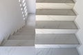 Elegant staircase with white marble steps Royalty Free Stock Photo