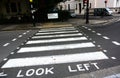 Look left. Zebra road crossing. Belgravia. London. UK Royalty Free Stock Photo
