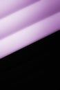 Elegant striped purple and black background pattern fading into white space Royalty Free Stock Photo