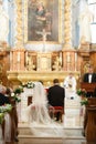 Elegant stylish cute groom and bride on the background old goth