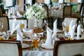 Elegant stylish decorated wedding reception tables with glasses Royalty Free Stock Photo