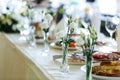 Elegant stylish decorated wedding reception tables with glasses Royalty Free Stock Photo