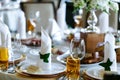 Elegant stylish decorated wedding reception tables with glasses Royalty Free Stock Photo