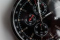 Close up front view of a modern wrist watch on the table. Soft focus. Royalty Free Stock Photo