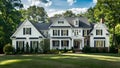 Elegant Suburban Retreat with Brick Details and Gabled Roof. Concept Suburban Living, Elegant Royalty Free Stock Photo