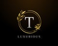 Elegant T Letter Floral Design. Circle Luxury T Gold Logo Icon Royalty Free Stock Photo