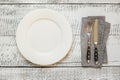 Elegant table place setting on white wooden table. Top view Royalty Free Stock Photo