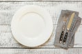 Elegant table place setting on white wooden table. Top view Royalty Free Stock Photo