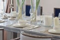 Elegant table set on marble dining table in modern style dining room Royalty Free Stock Photo