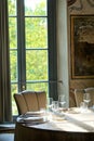 Elegant table setting against window and sunlight