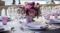 Elegant table setting with beautiful flowers at a luxury wedding reception venue Royalty Free Stock Photo
