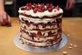 elegant table setting with black forest gateau centerpiece