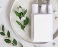 Elegant Table setting with a card decorated with eucalyptus branches top view, Wedding mockup Royalty Free Stock Photo