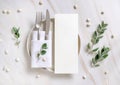 Elegant Table setting with a card decorated with eucalyptus branches top view, Wedding mockup Royalty Free Stock Photo