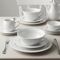 Elegant table setting featuring white porcelain Royalty Free Stock Photo