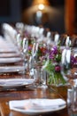 Elegant table setting with floral centerpiece for a wedding reception