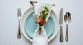 Elegant Table Setting with Floral Napkin Arrangement for Fine Dining