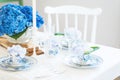 Elegant table setting with flowers Royalty Free Stock Photo
