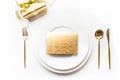 Elegant table setting with golden cutlery on white background. Top view Royalty Free Stock Photo