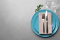 Elegant table setting on grey background. Space for text Royalty Free Stock Photo