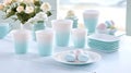 Elegant Table Setting with Pastel Colored Cups, Plates, Flowers and Easter Eggs for Spring Royalty Free Stock Photo