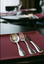 Elegant Table Setting with Silver Cutlery and Red Napkin Royalty Free Stock Photo
