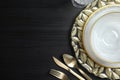 Elegant table setting and space for text on dark background Royalty Free Stock Photo