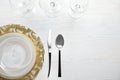 Elegant table setting with space for text on light background Royalty Free Stock Photo