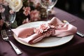 Elegant table setting in white and pink tones ready for the arrival of guests. Table set for an event party or wedding reception. Royalty Free Stock Photo