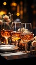 Elegant table settings for fine dining, crystal glassware, and a beautifully blurred background Royalty Free Stock Photo