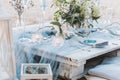 Elegant table setup in blue pastels for a beach wedding Royalty Free Stock Photo