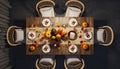 Elegant Thanksgiving Dinner Table Setting with Pumpkins and Fall Decor Royalty Free Stock Photo