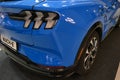 Elegant three-segment LED tail lights on crossover SUV Ford Mustang Mach-E Royalty Free Stock Photo