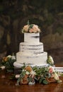 Elegant three tiered wedding cake at a wedding reception Royalty Free Stock Photo