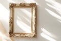 Elegant top view composition featuring luxurious picture frame placed on clean white background with delicate fabric Royalty Free Stock Photo