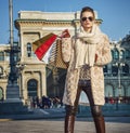 Elegant tourist woman shopper in Milan, Italy standing Royalty Free Stock Photo