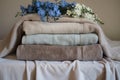 elegant towel display with forgetmenots on top Royalty Free Stock Photo