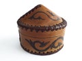 Elegant traditional Moroccan round leather box with lid. Arabic handicraft on white background