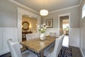 Elegant transitional dining room with board and batten walls Royalty Free Stock Photo