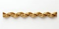 Elegant Twisted Gold Rope Isolated on White Background. Generative ai Royalty Free Stock Photo
