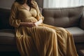 Elegant unrecognizable pregnant woman lovingly cradling her waistline with tender hands