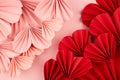 Elegant Valentine day background with border of many sweet pink and passion red origami paper hearts on soft light pastel pink. Royalty Free Stock Photo