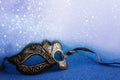 elegant venetian mask on blue glitter background Royalty Free Stock Photo