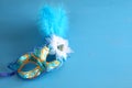 elegant venetian mask on blue wooden background Royalty Free Stock Photo