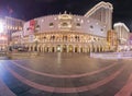 The Venetian Resort in Las Vegas glows elegantly at dusk, its grand facade echoing the charm of Italian renaissance architecture