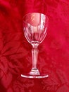 Elegant Vintage Cut Crystal Glass Stemware on Red Background Royalty Free Stock Photo